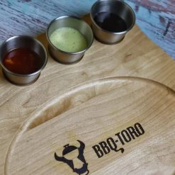 BBQ-Toro Gusseisen Servierpfännchen Mit Edelstahl Dippschalen Und Holzunterlage | 24 X 17,5 Cm Oval -Camping Store pan26 actionbild2 1679px 1280x1280